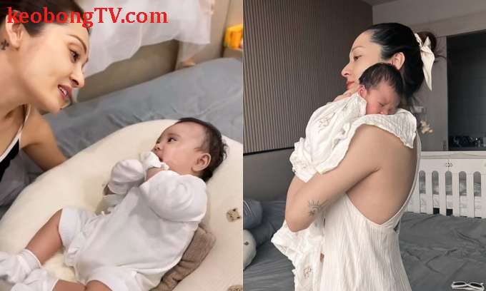 Bảo Anh chơi đùa cùng con gái lúc một tháng tuổi